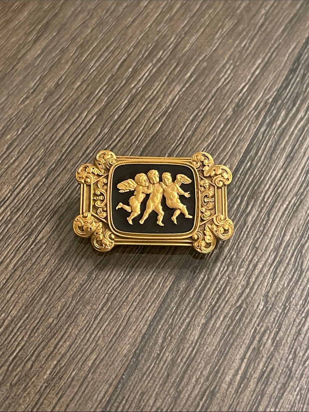 Neo-Classical Ornate Goldtone Dancing Cherub Angels Black Enamel Rectangular Pin